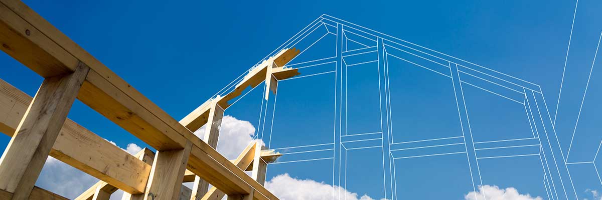 A completed house frame fades out into a blueprint design
